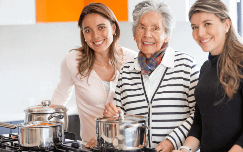 image shows an elderly lady with her family